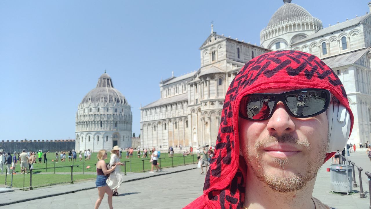 selfie with Pisa cathedral in background