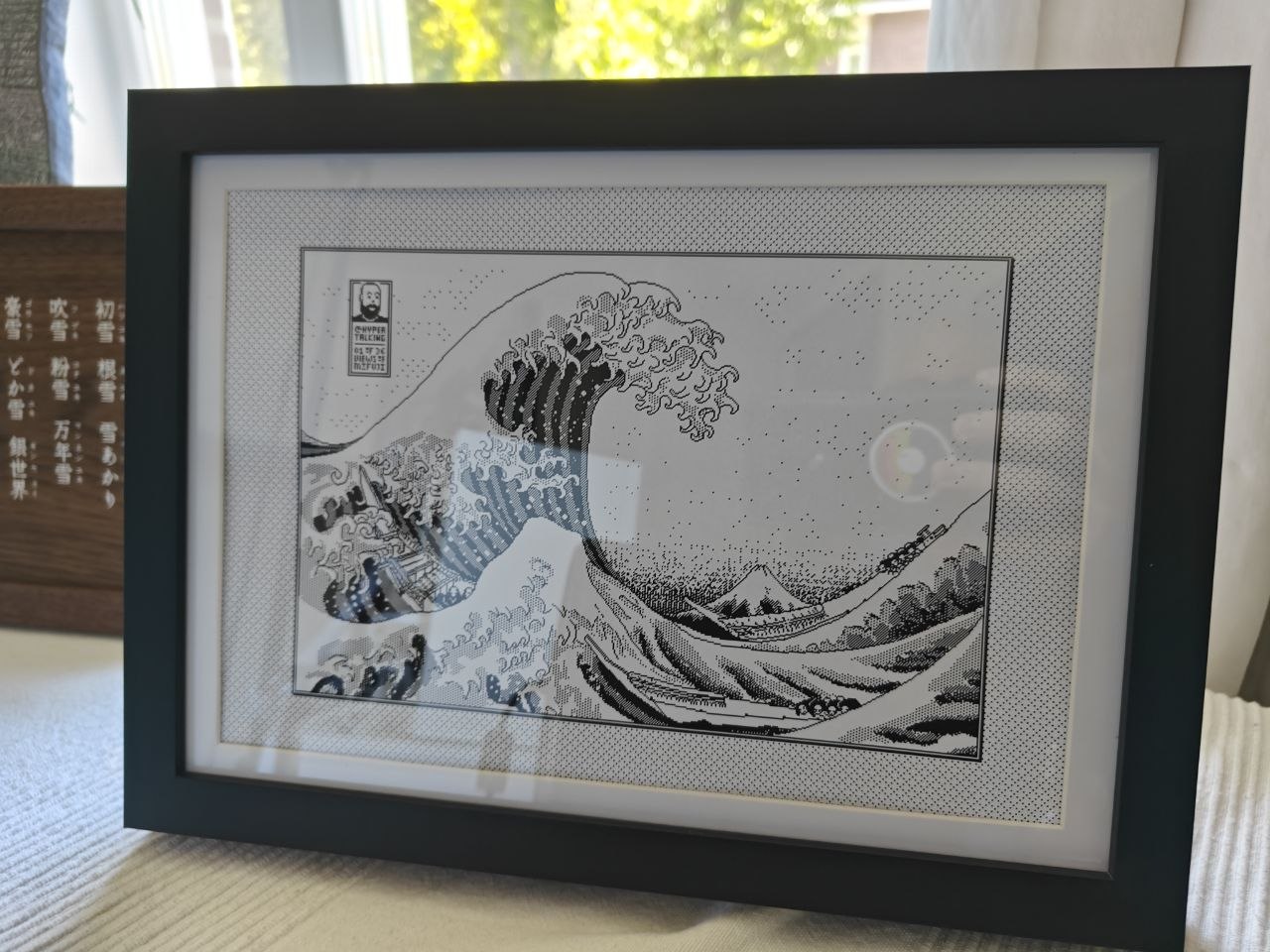 Framed art by James Weiner.